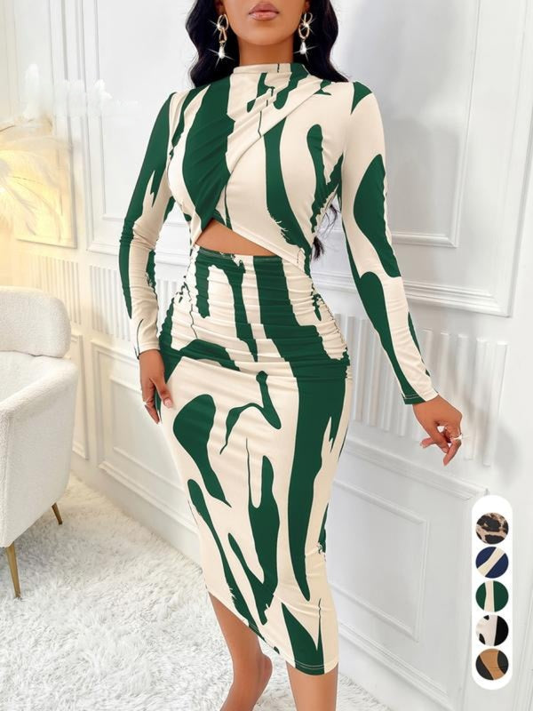 Figurbetontes Cut-Out Kleid mit Colorblock-Design | Aria