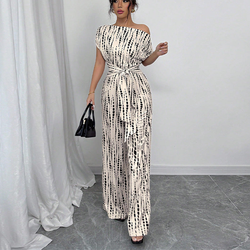Eleganter Jumpsuit mit weitem Bein und Schrägträgern | Kendra