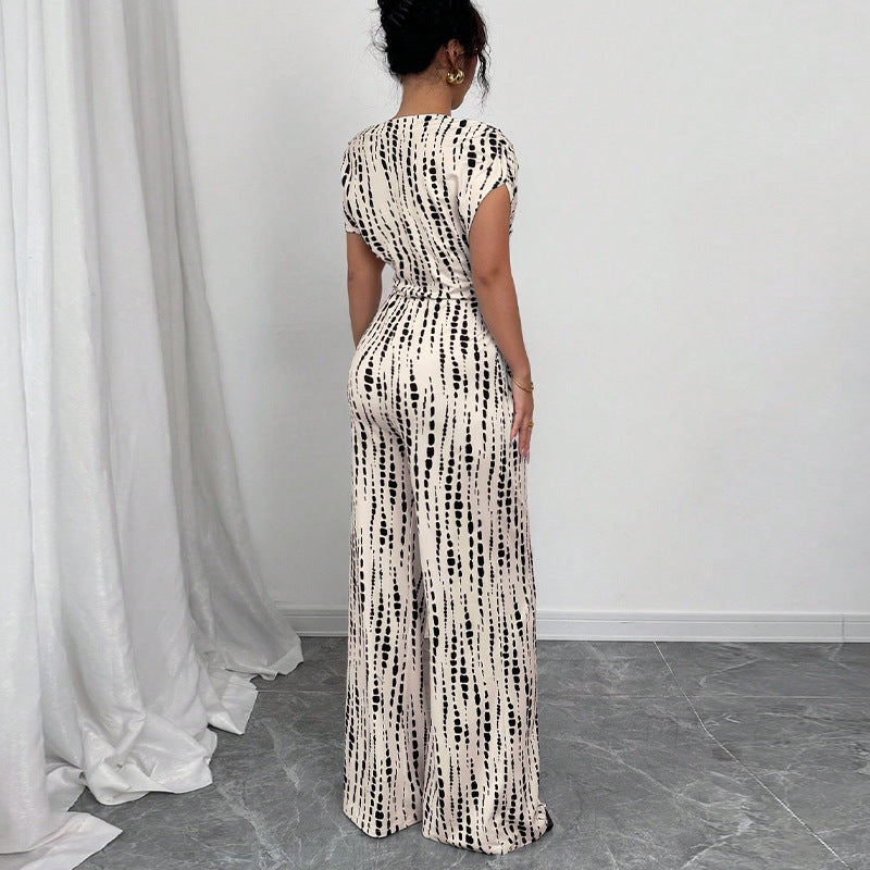 Eleganter Jumpsuit mit weitem Bein und Schrägträgern | Kendra