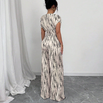 Eleganter Jumpsuit mit weitem Bein und Schrägträgern | Kendra