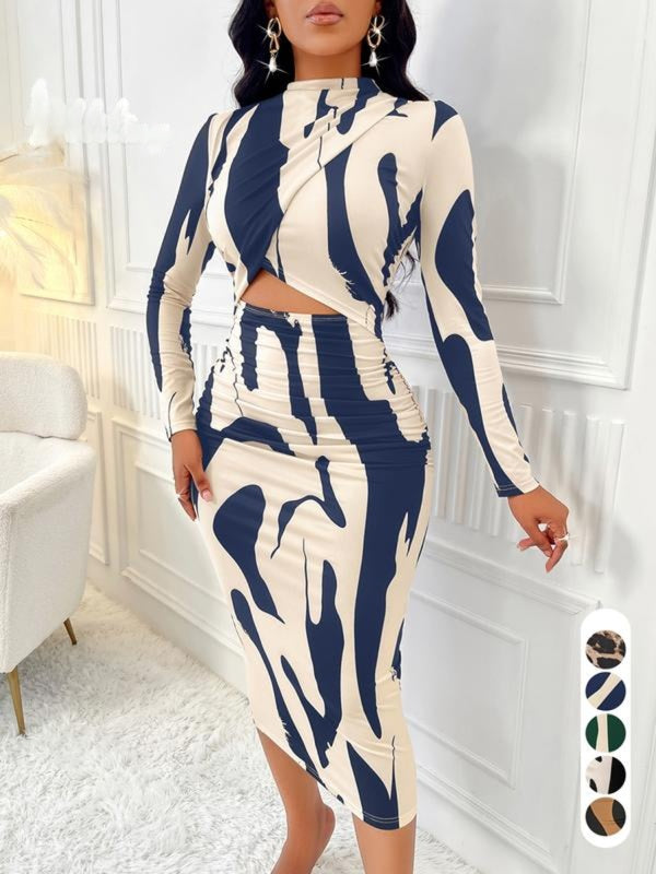 Figurbetontes Cut-Out Kleid mit Colorblock-Design | Aria